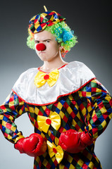 Funny clown with box gloves