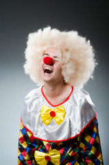 Funny clown in the studio