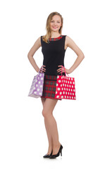 Woman after shopping spree on white