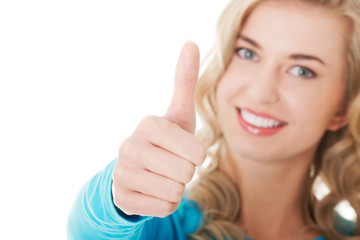 Happy woman with ok hand sign
