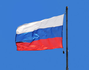the national flag of Russia on the sky background