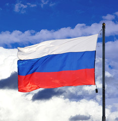 the national flag of Russia on the sky background