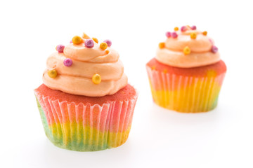 Colorful cupcakes isolated on white