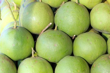 Green grapefruit at market.