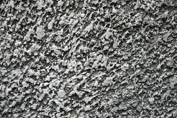 Rugged white cement and concrete wall