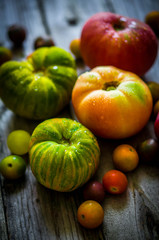 Heirloom tomatoes on rustic background