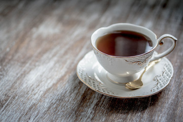 Cup of tea on wooden background
