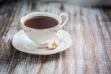 Cup of tea on wooden background