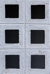 Brick wall with square pattern