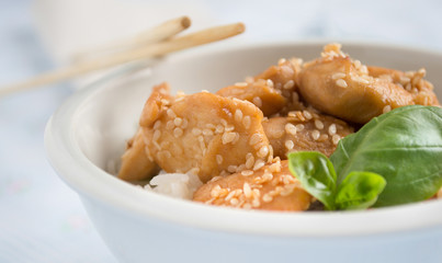 Sesame chicken with chop sticks