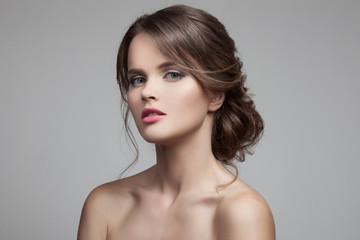 Beautiful Blond Woman. Hairstyle and Make-up.