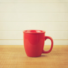 Retro photo of coffee cup in instagram style.