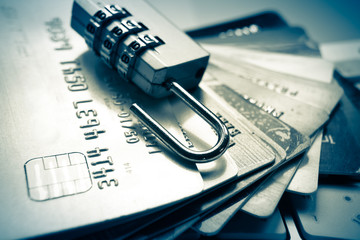 open security lock on credit cards with computer keyboard