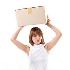 unhappy, bored woman carrying heavy box with boredom