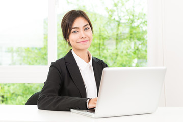 Business woman using computer laptop