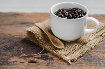 coffee beans in the white cup