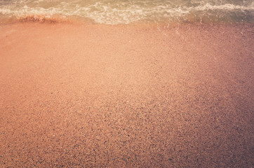 Wave of the sea on  sand beach vintage