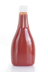 A bottle of tomato ketchup, isolated on a white background