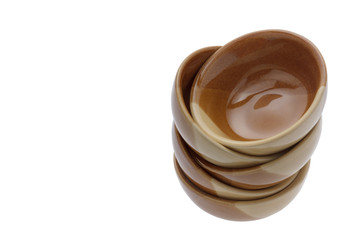 stack of brown bowls isolated on white background.clipping path.