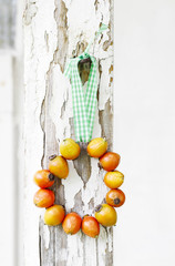 Wreath made of rose hip fruits