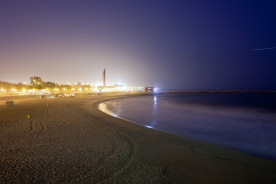 Icaria Beach In Barcelona At Night