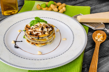 Grilled eggplant with feta cheese,parmesan basil, nuts