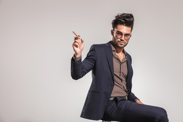 cool elegant man with cigar ready to smoke