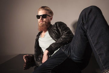 Angle view of a male model sitting