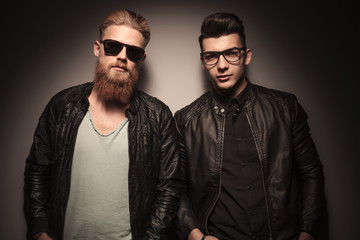 Two hot guys in leather jacket posing