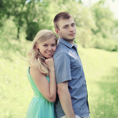 Portrait lovely young couple in spring day