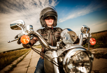 Biker girl on a motorcycle