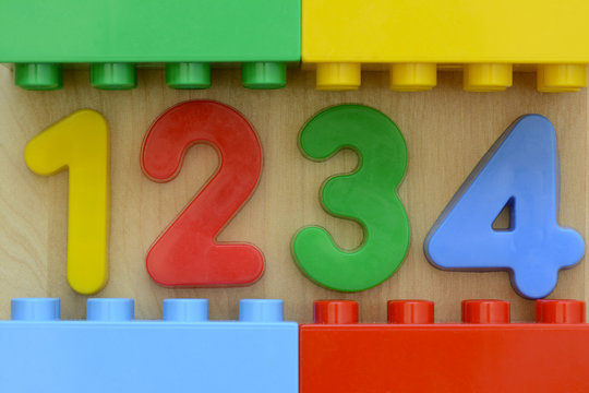 Close up of colorful 1 2 3 4 in plastic toy numbers