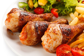 Grilled chicken legs with vegetables