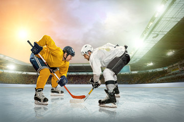 Ice hockey player on the ice. Open stadium - Winter Classic game