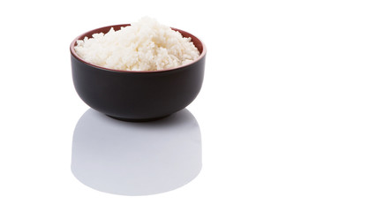 A bowl of rice over white background 