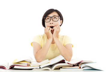 surprised young student girl with many book