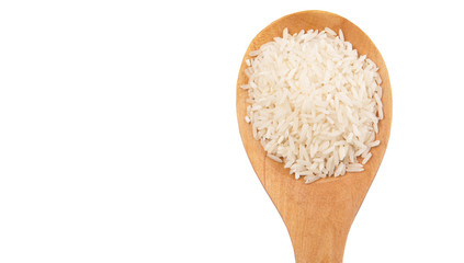 Raw and uncooked rice in wooden spoon over white background