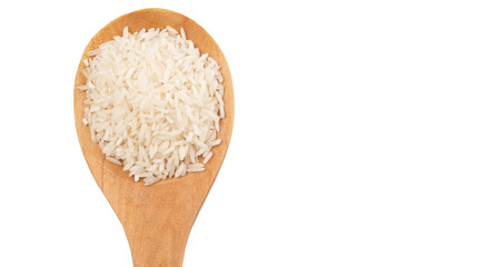 Raw and uncooked rice in wooden spoon over white background