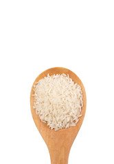 Raw and uncooked rice in wooden spoon over white background