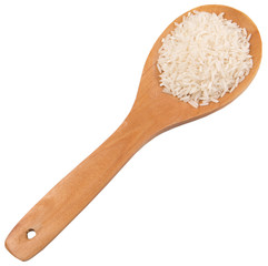 Raw and uncooked rice in wooden spoon over white background