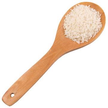 Raw And Uncooked Rice In Wooden Spoon Over White Background