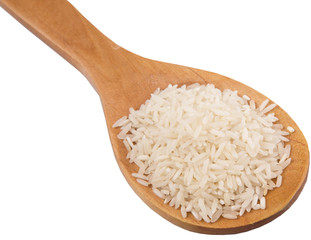 Raw and uncooked rice in wooden spoon over white background