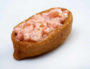 inari sushi with salmon and roe tobiko