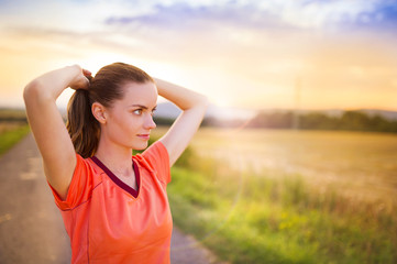 Running woman stretching