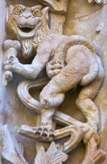 Fototapeta na wymiar Creature with ice cream carved in stone; Salamanca, Spain