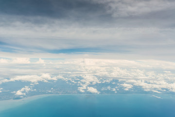 Airplane trace over the clouds