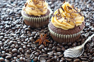 Dessert with chocolate cupcakes decorated with caramel cream