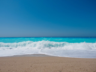 wild beach with rocks in water. Island Lefkada, Greece