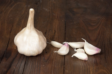 garlic on old wooden table