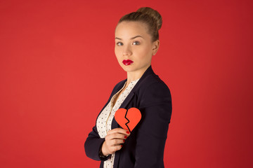 business woman holding a heart